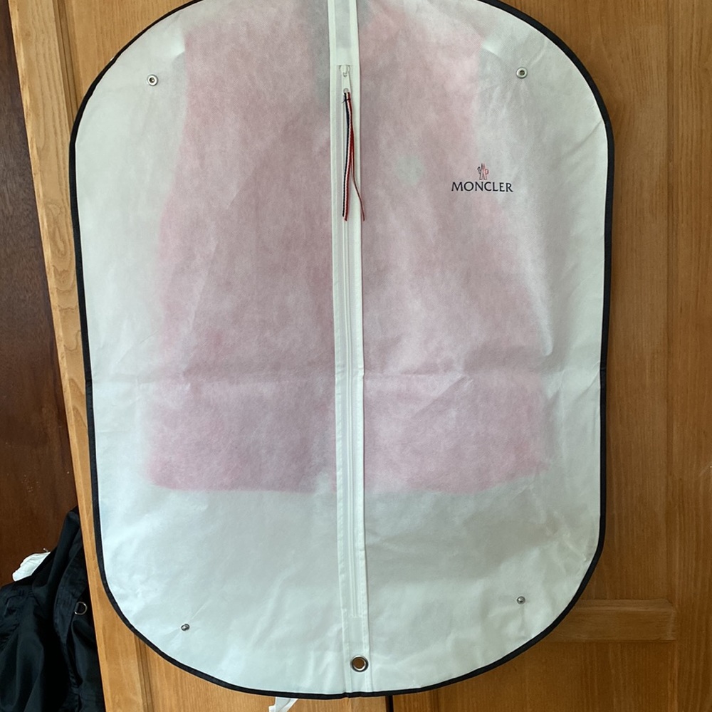 Newly stuffed light weight vest from Moncler NYC. - Picture 8 of 12